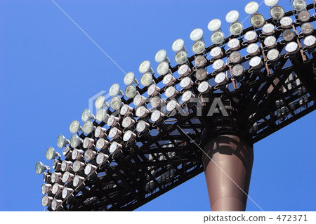 Stadium lighting equipment and blue sky 472371