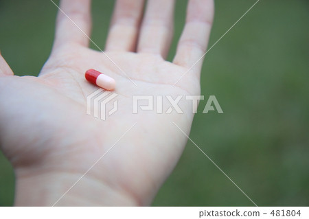 Medicine placed on the palm of your hand Medicine placed on the palm of your hand 481804