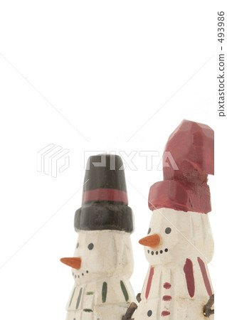 土氣和逗人喜愛的聖誕老人由木頭製成 土氣和逗人喜愛的聖誕老人由木頭製成 493986