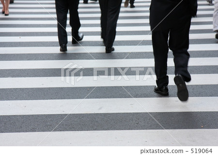 A salaryman crossing a pedestrian crossing 519064