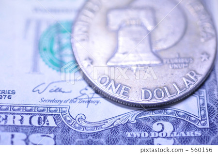 1 dollar coin and 2 dollar bill 560156