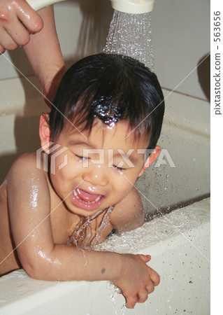 Child taking a shower 563656