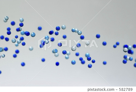 Blue fine particles floating in liquid Blue fine particles floating in liquid 582789