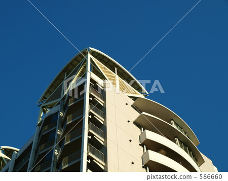 A building rising in the blue sky A building rising in the blue sky 586660