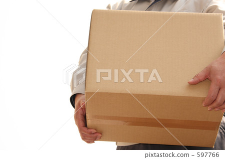 Male hand carrying cardboard 597766