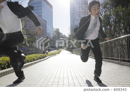 Running businessman Running businessman 609343