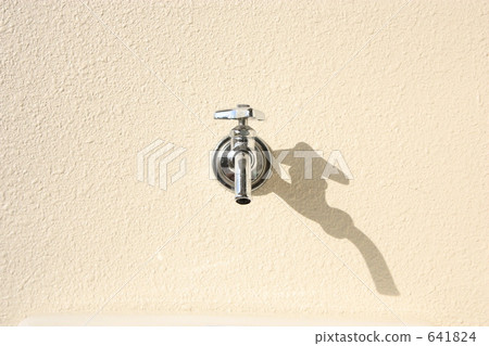 A faucet in the sunshine of summer A faucet in the sunshine of summer 641824