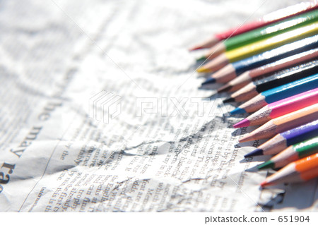 English newspaper and colored pencils English newspaper and colored pencils 651904