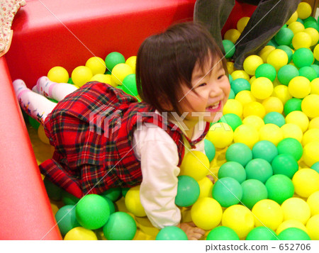 Girls playing in the ball pool 652706