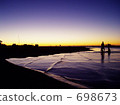Children playing on a shallow beach 698673
