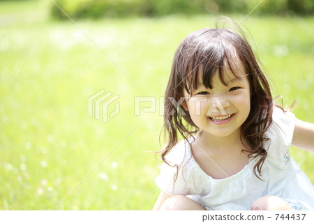 A girl with a fresh green and a smile 744437