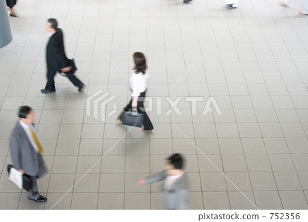 Businessman & woman going and going Businessman & woman going and going 752356