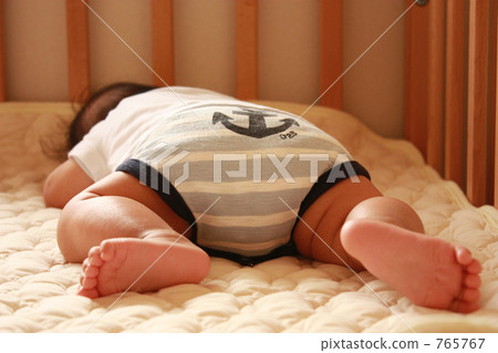 Baby sleeping on his stomach Baby sleeping on his stomach 765767