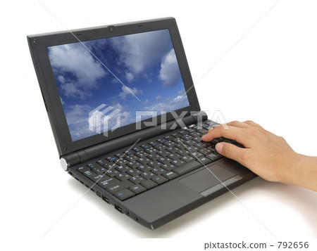 Laptop computer and hand 792656