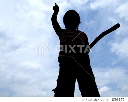 A blue sky and boy's silhouette A blue sky and boy's silhouette 856171
