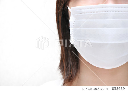 A woman wearing a mask 858689