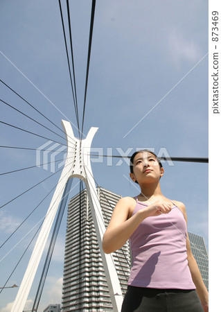 A woman image running in the city A woman image running in the city 873469