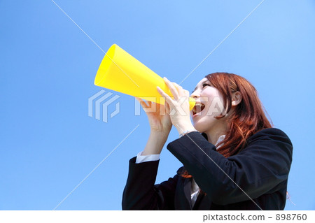 Business woman shouting with megaphone 898760