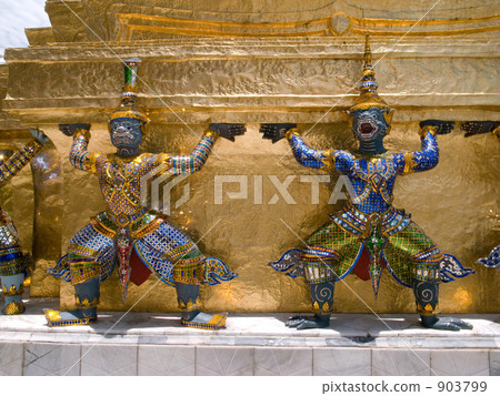 Devil and monkey god standing on the pagoda pedestal of Wat Phra Keo 903799