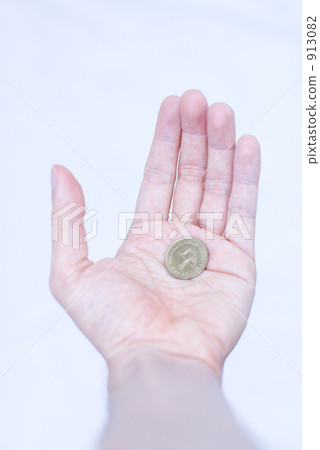 Hand with coins Hand with coins 913082