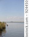 People who take shrimps along the river People who take shrimps along the river 924450