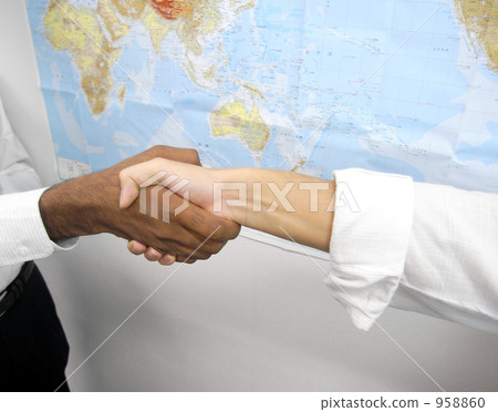 Handshake in front of the world map 958860