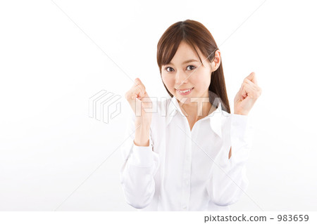 A young woman who plays guts pose 983659