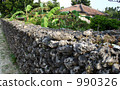 Ishigaki and red brick roof of Taketomi-jima Island 990326