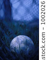 Soccer ball aside the ground 1002026