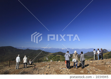 People who look at the Alps from Kusatsu Shirane volcano 1034945