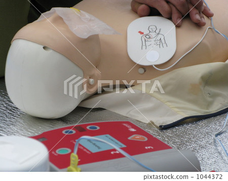 automated external defibrilator, heart massage, blue sheeting 1044372