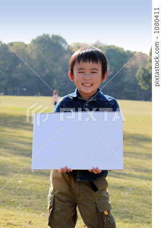 Sketchbook and boy 1080411