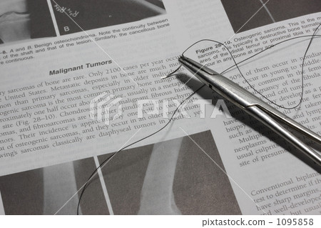 Surgical image needle holder and medical book 1095858