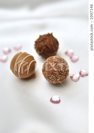 Silver satin cloth and round chocolate. Silver satin cloth and round chocolate. 1097146