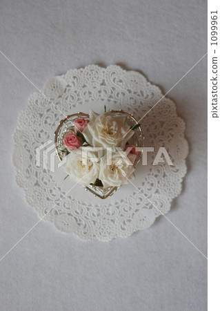 Roses in a heart shaped wire basket 1099961