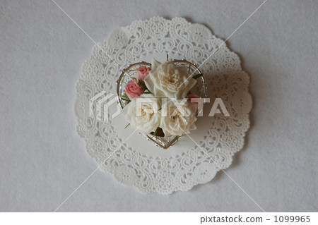 Roses in a heart shaped wire basket 1099965