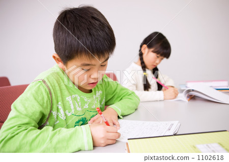 Elementary school student caressing hands Elementary school student caressing hands 1102618