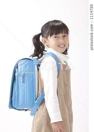 A girl in a school bag 1114780