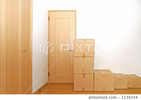 Moving cardboard piled up in the living room 9 1130244