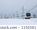 Limited express Azusa running through the snow 1150381