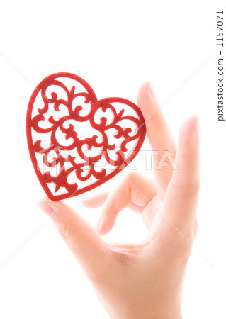 Women's hand with heart shaped cutwork Women's hand with heart shaped cutwork 1157071