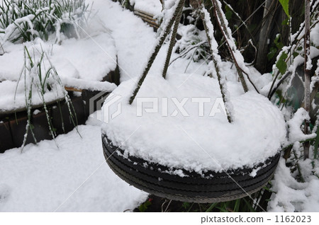 tire, fallen snow, play equipment 1162023