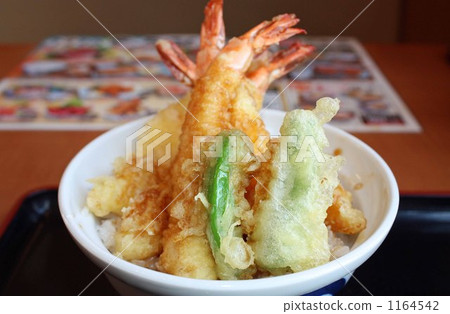 Bowl of rice and fried fish 1164542