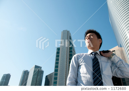 Businessman and skyscraper 1172680