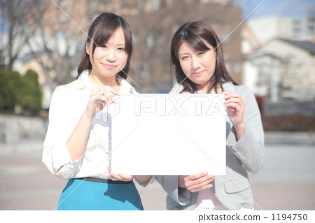 Two women with whiteboard 1194750