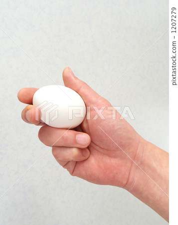 Egg in one hand Egg in one hand 1207279