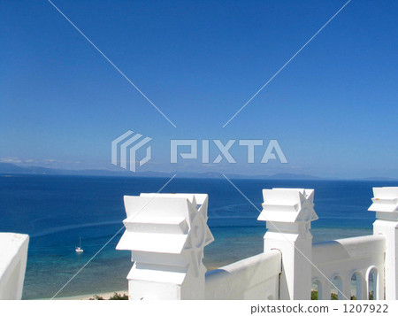 White fence of fashionable lighthouse and blue sky and sea White fence of fashionable lighthouse and blue sky and sea 1207922