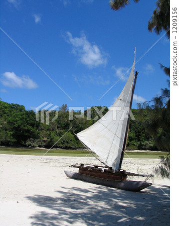White sail boat of Ile des Pins and white sand beach 1209156