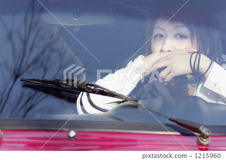 A boyish girl holding a handle. A fun drive. 1215960