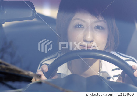 A boyish girl holding a handle. A fun drive. A boyish girl holding a handle. A fun drive. 1215969